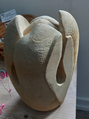 organic bud like stone carving bursting out in spring