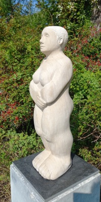 female stone figure