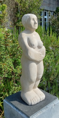 STONE CARVING OF FEMALE STANDING